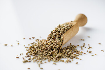 aromatic dry anise seeds on a white background