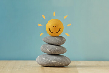 Stacked Zen stones with Happy round face - Concept of mental balance and positivity