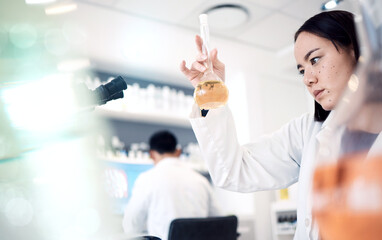 Science, research and woman with liquid in test tube for analysis, medical testing and analytics in...