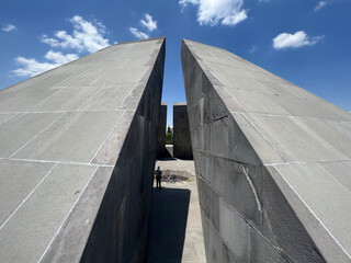 Man standing in Tsitsernakaberd Monument to commemorate the victims of the Genocide in Yerevan in Armenia