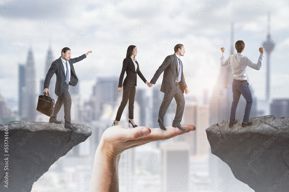 Poster Contemporary image of team helping each other walk through difficulty on abstract city background with cliff gap. Teamwork, help, success and union concept.