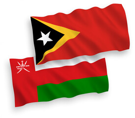 Flags of Sultanate of Oman and East Timor on a white background