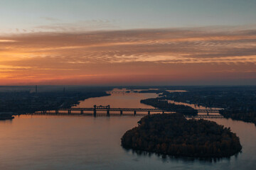A beautiful sunset or dawn sky from a height above the city. Dnipro.Ukraine. Background picture. Dramatic evening cloud landscape in the city. Drone photography. Ukrainian city