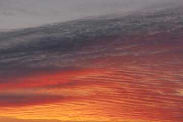 Beautiful sunset or dawn sky. background image. Evening cloudy landscape in the city. Sky textures.