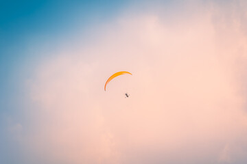 Motor Paraglider flying over sky of Ho Chi Minh City, Vietnam during New Year Festival and National Day