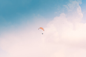 Motor Paraglider flying over sky of Ho Chi Minh City, Vietnam during New Year Festival and National Day