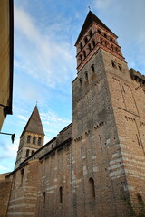 Fototapeta na wymiar Saint Philibert Abbey Church in Tournus, Burgundy, France, with its Roman external facade and towers