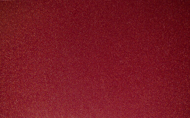 Background from decorative plaster with abstract patterns and stains. Fancy red and pink decoration wall texture, creative purple surface background. Finishing coating for building cladding.