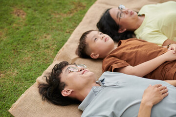 Fototapeta premium Family Relaxing in Park