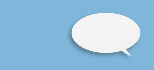 white paper with speech bubbles isolated on blue background communication bubbles