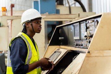 Fototapeta na wymiar Team of engineers practicing maintenance Taking care and practicing maintenance of old machines in the factory so that they can be used continuously...