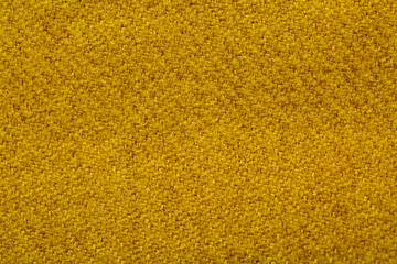 Close-up fabric swatches as a background. The texture of the material with patterns of weaving close-up. Upholstery fabric for interior decoration.