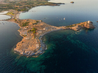 Top view with drone of Nora archaeological site at sunset Sardinia, Italy.
Ancient Roman ruins in Nora, near Pula in Sardinia, Italy - obrazy, fototapety, plakaty