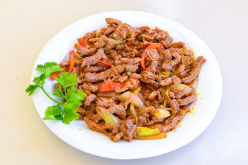 Beef steak grill with rice pilaf, fried potatoes, grilled pepper and tomatoes.Mix Platter with Beef rips, Cutlets, Potatoes and Sauces.