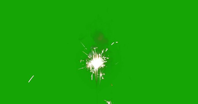 Sparkler on green screen background. Burning spark fuse or bengal fire Isolated. Lightening Christmas sparkler. Ideal for background or over-layer with blending mode add, screen, lighten.