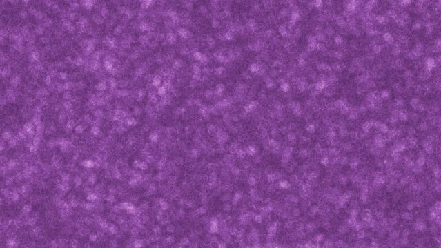 Abstract background of purple particles blurring irregularly