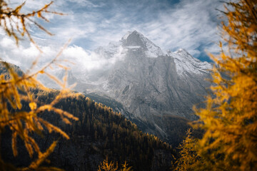 MArmolada mountain during autum with yellow larches on the foreground. South Tyrol, Italy. - 551778811