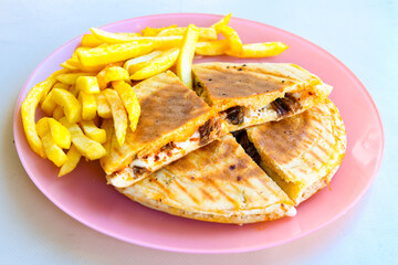 Turkish karisik atom  tost ( kasarli bazlama tost) . Sucuklu, Kasarli, kavurmali karisik tost. Flat baked bread toasted