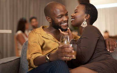 Love, event or couple of friends at a party in celebration of new years drinking wine or whiskey on holiday. Romance, black woman and black man talking, embrace or bonding on a relaxing romantic date