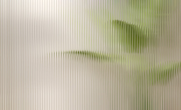 Clear and glossy reeded glass partition wall in dappled light with beautiful green tropical banana tree in bathroom or luxury interior design, architecture and product display background