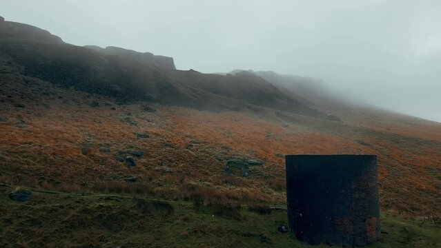 Standedge Tunnel Ventilation Chimney Shaft's High On The Pennines Smoking As A Railway Train Pass Through The Tunnel Between Marsden Yorkshire And Lancashire