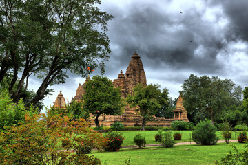 View of the main monuments and tourist spots in Khajuraho (India), in the state of Madhya Pradesh. Khajuraho temples. Erotic sculptures of the Kamasutra (9th century)