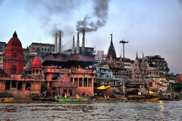 View of the main monuments and tourist spots of Varanasi (India). Holy river Ganges (Ganga). Crematorium. Ghats