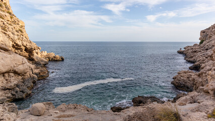 Fototapeta na wymiar Beaches, cliffs and tourist places in the south of Spain. White coast in the Valencian Community.