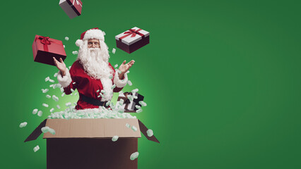 Santa Claus in a delivery box with gifts
