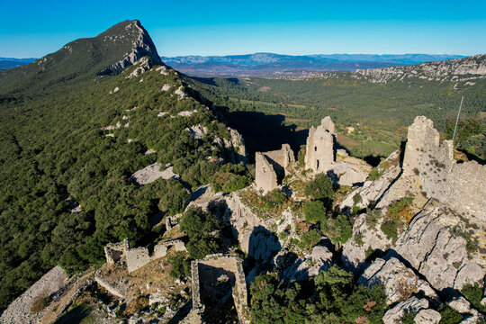Aerial view of the Pic Siant  the Ch&acirc;teau de Montferrand on the ridge of the Pic Saint Loup in Herrault, Occitanie, France