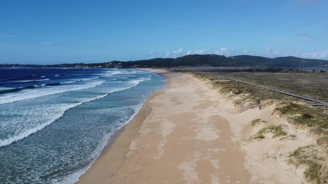 perfect beach scenery at lanzada in galicia spain, sun