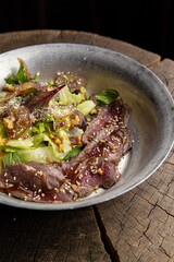 Salad with roast beef, lettuce and corn