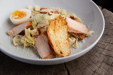 Caesar salad with smoked chicken