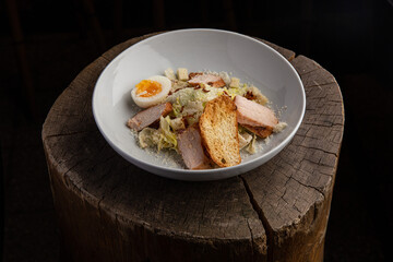 Caesar salad with smoked chicken