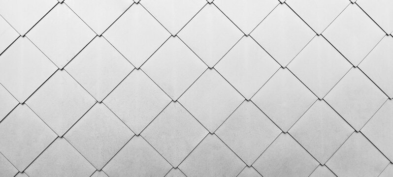 Architecture details roof pattern geometric abstract background. Gray square shingle tile close up.