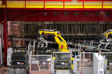 Production of cremant sparkling wine in Burgundy, France. Automatically powered bottling lines on factory.