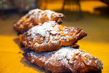 French sweet dessert pastry with almonds on display in french bakery