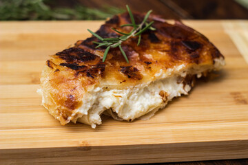 Cheese delicious pie on cutting board