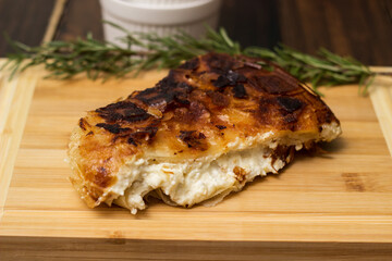 Cheese delicious pie on cutting board