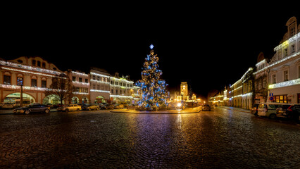 Fototapeta na wymiar Decorated town in Advent - evening photography of the Czech city of hops