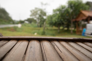 Fototapeta premium Wooden table, selective focus on blurred background