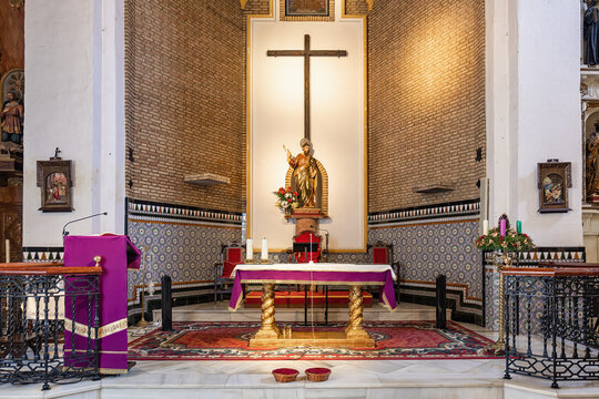 Huelva, Spain-December 4, 2022: Main Altar of the parish of San Bartolome, the most important building the municipality of Beas. It is consecrated under the invocation of the apostle Saint Bartholomew