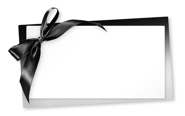 White Blank gift greeting card ticket with bright black ribbon bow, isolated on background,...