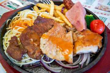 Delicious assorted meat steak meal in Hong Kong style tea restaurant