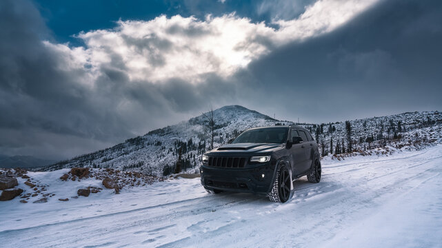 Nelson, British Columbia, Canada - December  05, 2022 Jeep grand cherokee wk2 Trackhawk in winter on the mountain in a snowfall