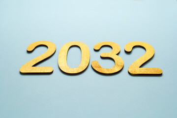 golden numbers 2023 on a blue background