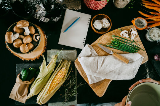 Directly above view of fresh vegetables and diary kept on counter in studio