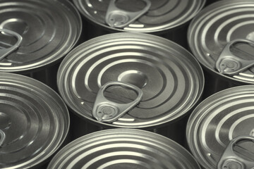 Sealed metallic cans with preserves. Long term storage for food.