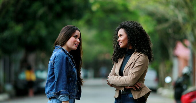 Diverse Friendship, Two Women Talking Outside At Park