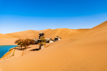 Fototapeta na wymiar Crescent Spring and Mingsha Mountain in Dunhuang